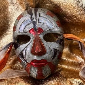 Vintage Mardi Gras mask cast metal metallic colors & beribboned measures 5” X 4”